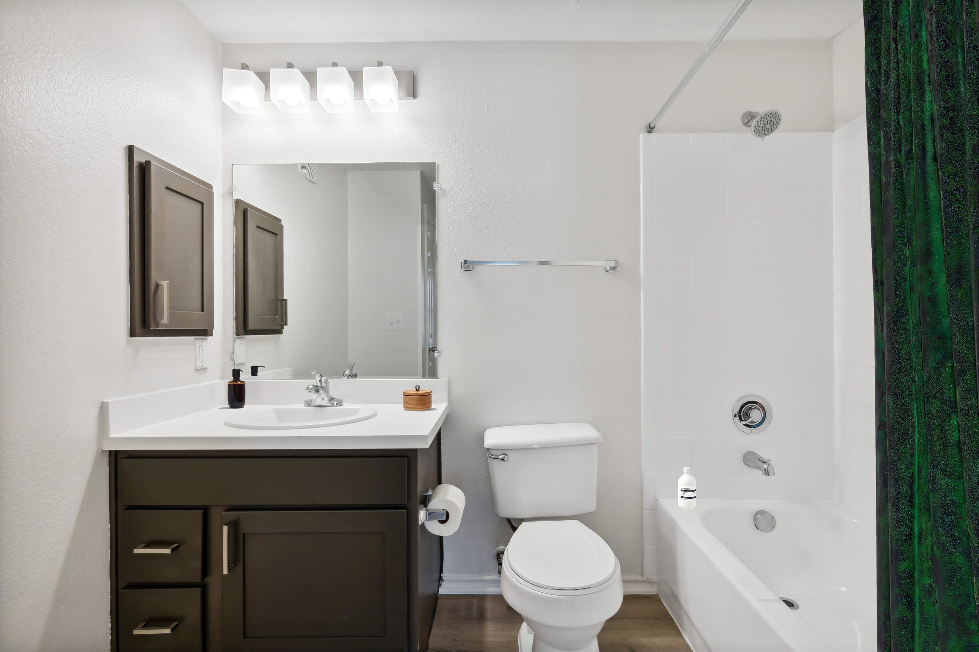 Bathroom with sink and toilet at Bonito Parque Apartments in San Antonio TX